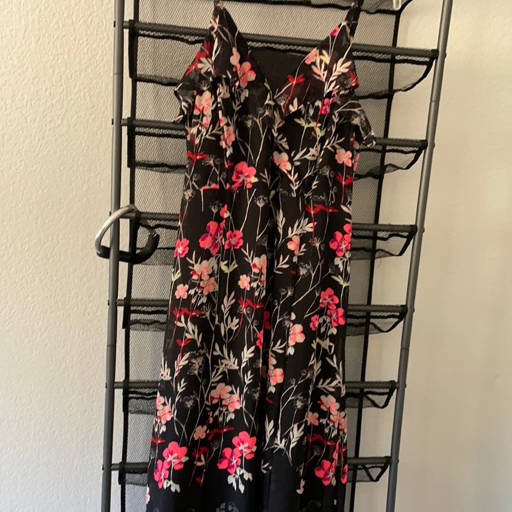 Great dress can be worn with many blazers or alone .